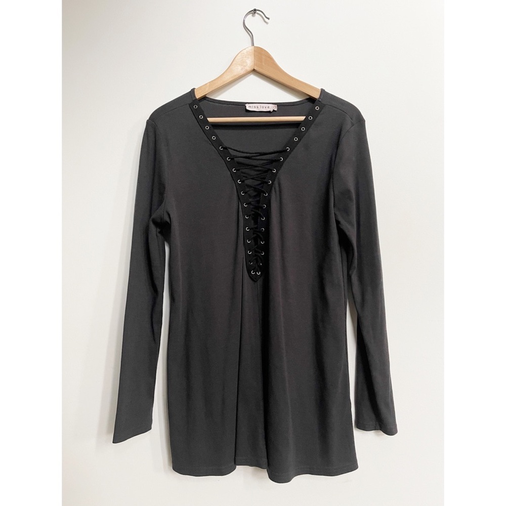 Long sleeve lace up knit top